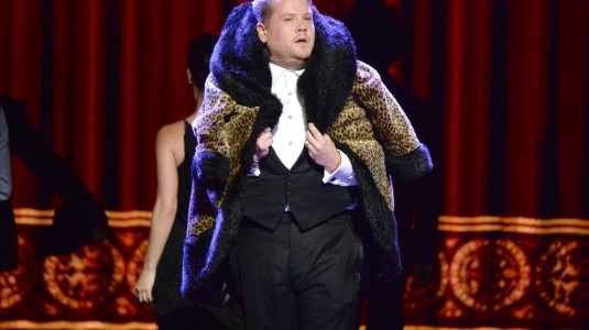 James Corden hosts the event in a bright outfit.